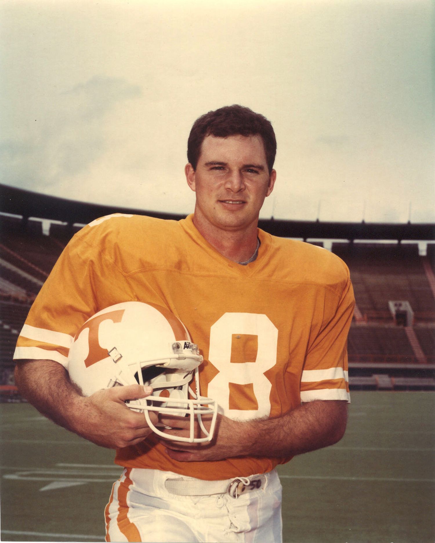 Vintage football photos showing player in yellow jersey with number 40 on practice field.