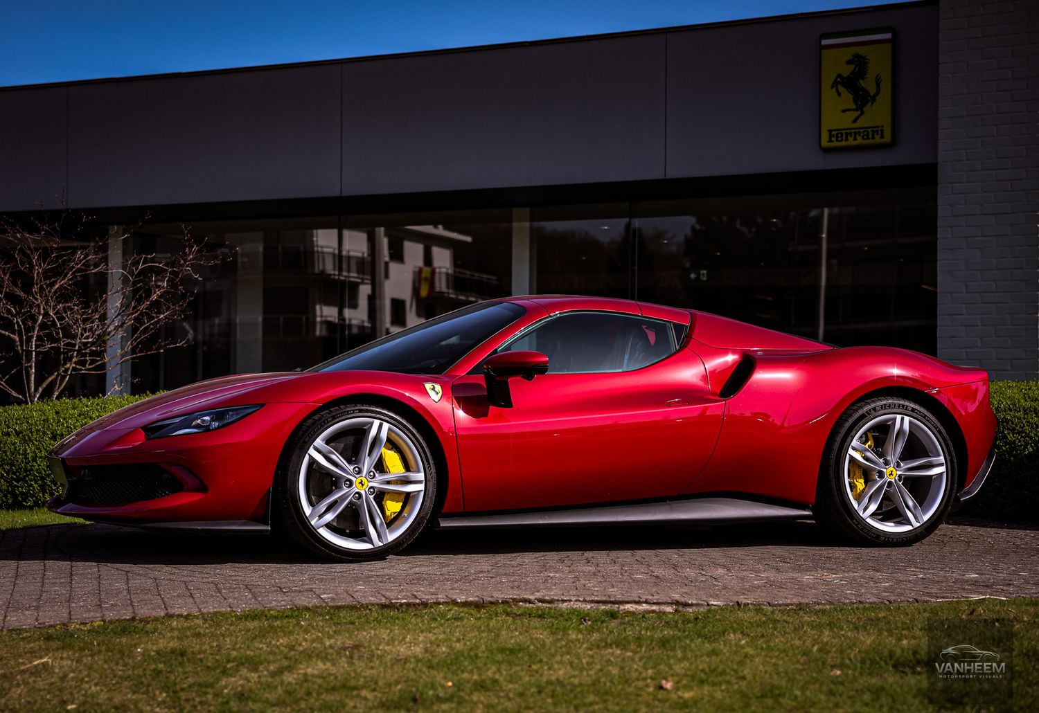 Side profile views of a red Ferrari SF90 Stradale against natural outdoor lighting.