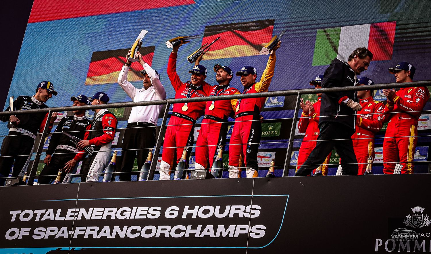 Ferrari team celebrates on the podium at TotalEnergies 6 Hours of Spa-Francorchamps race event.