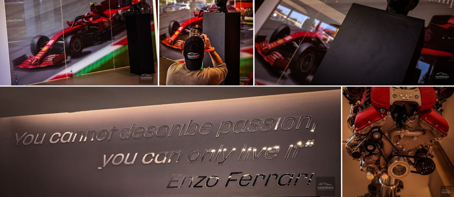 Ferrari dealership interior with red ambient lighting and modern display elements.