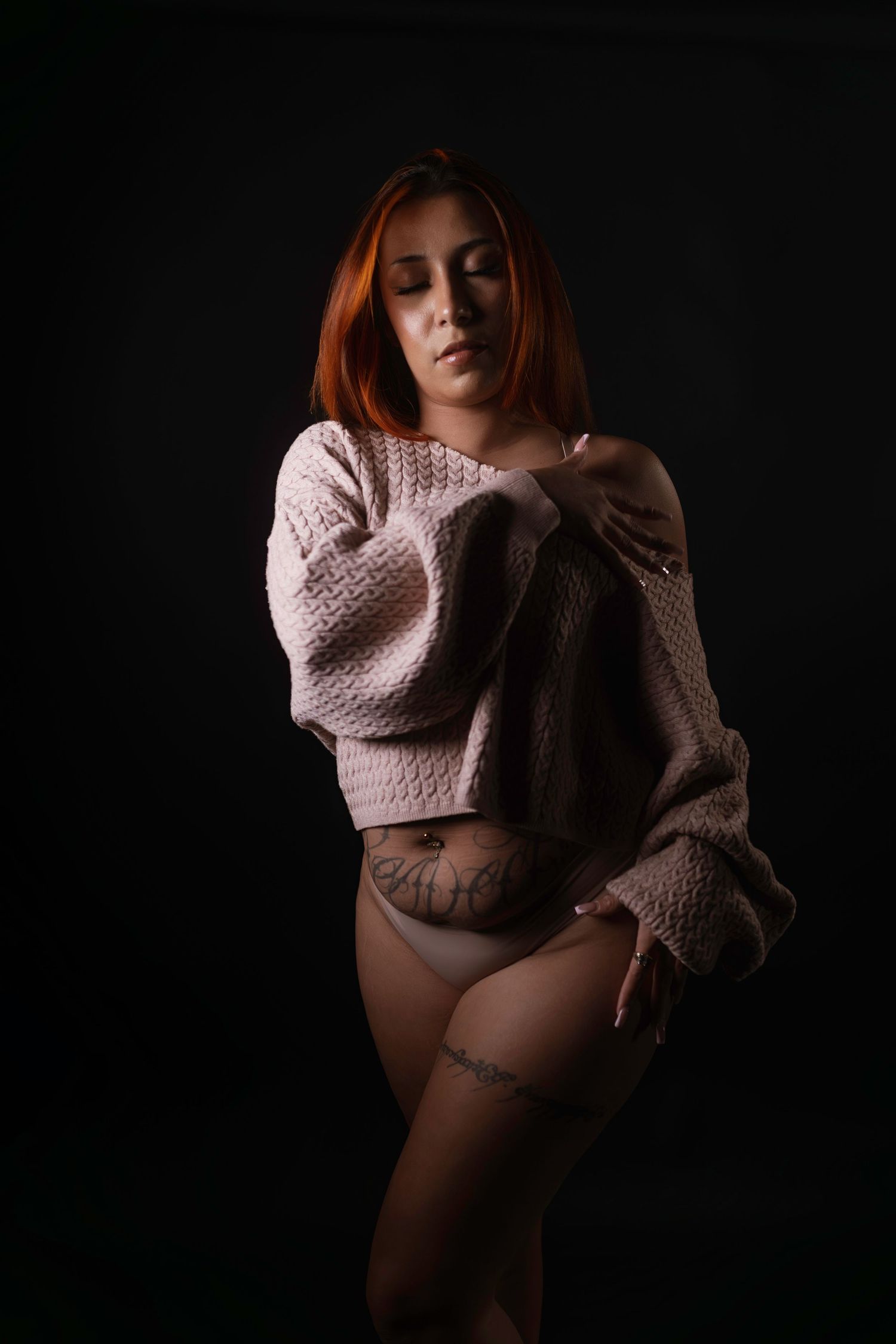 Moody fine art boudoir portrait, single light source, boudoir photographer Fort Worth.