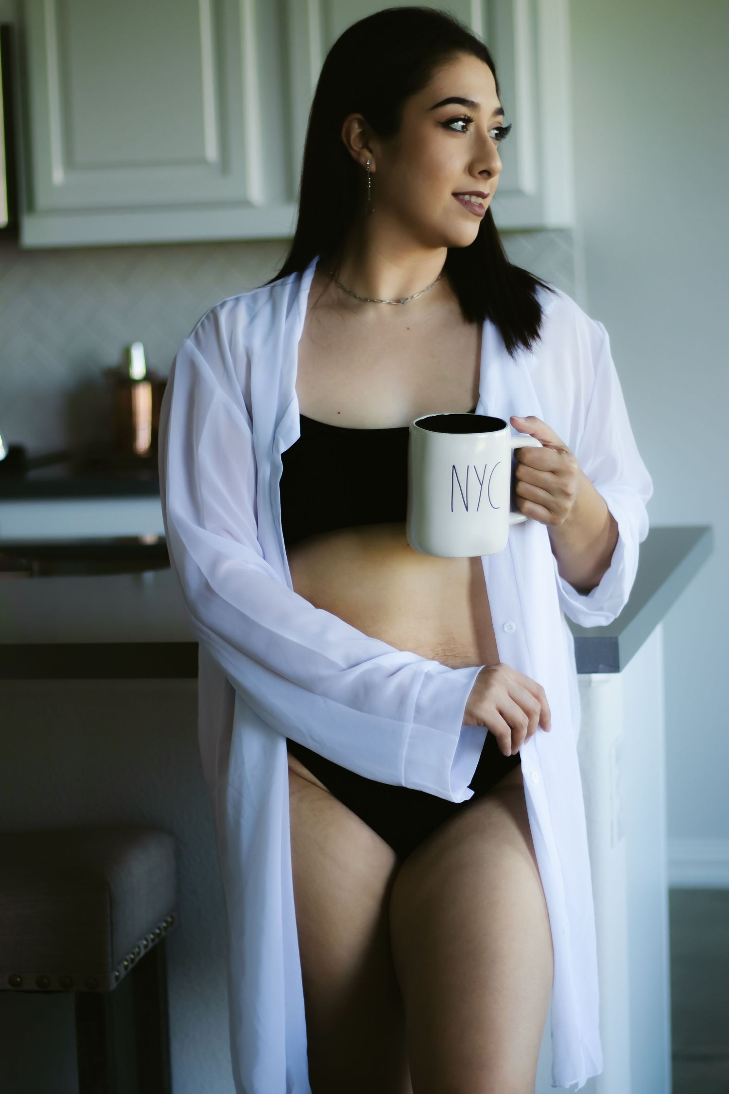 Texas boudoir photographer, Lock and Key captures this soft and romantic boudoir photo in a home session.