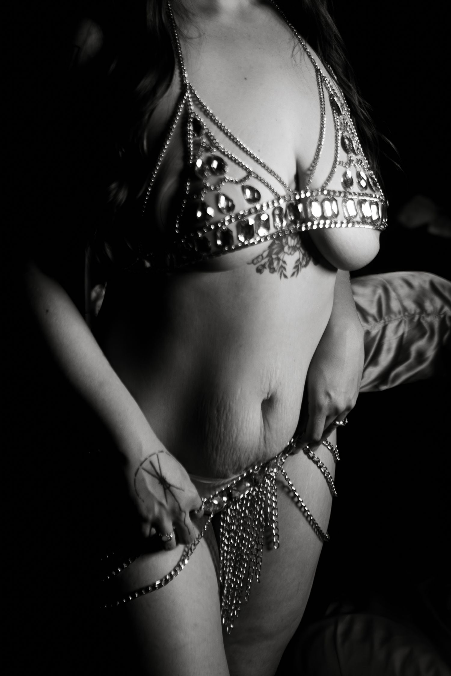 Woman in ornate bodychain, black and white boudoir photo, luxury boudoir studio serving Dallas.