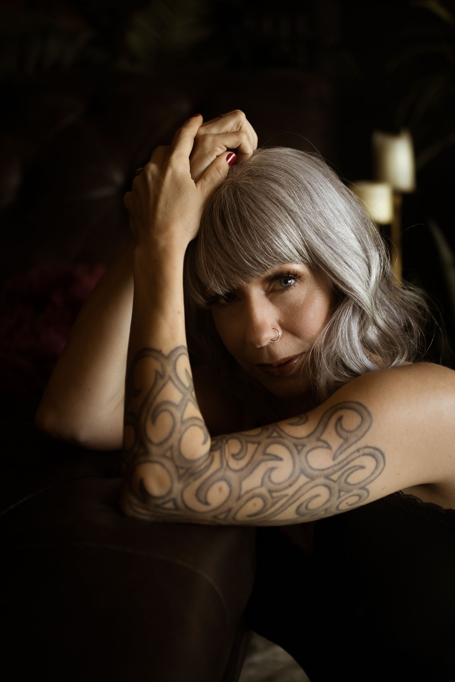 Woman celebrating her 50th birthday with a boudoir session — Fort Worth boudoir photography for women over 50.