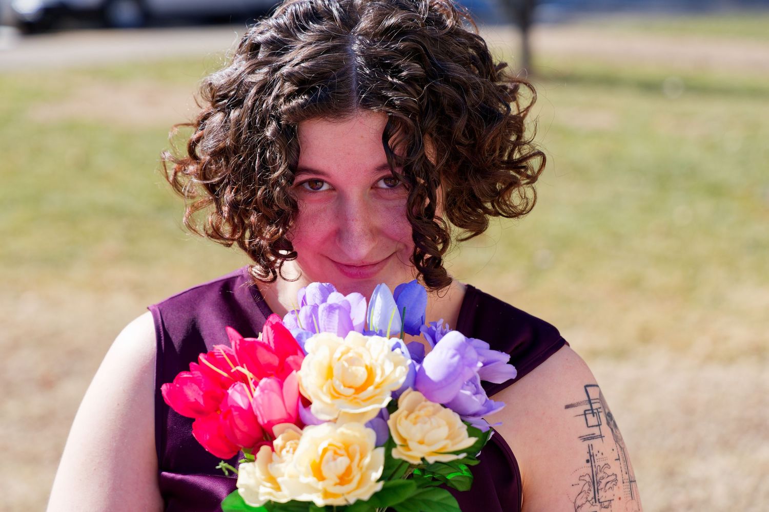 Person holding colorful bouquet of roses and tulips outdoors in spring. Valentines event, Richmond RVA, Midlothian, Virginia