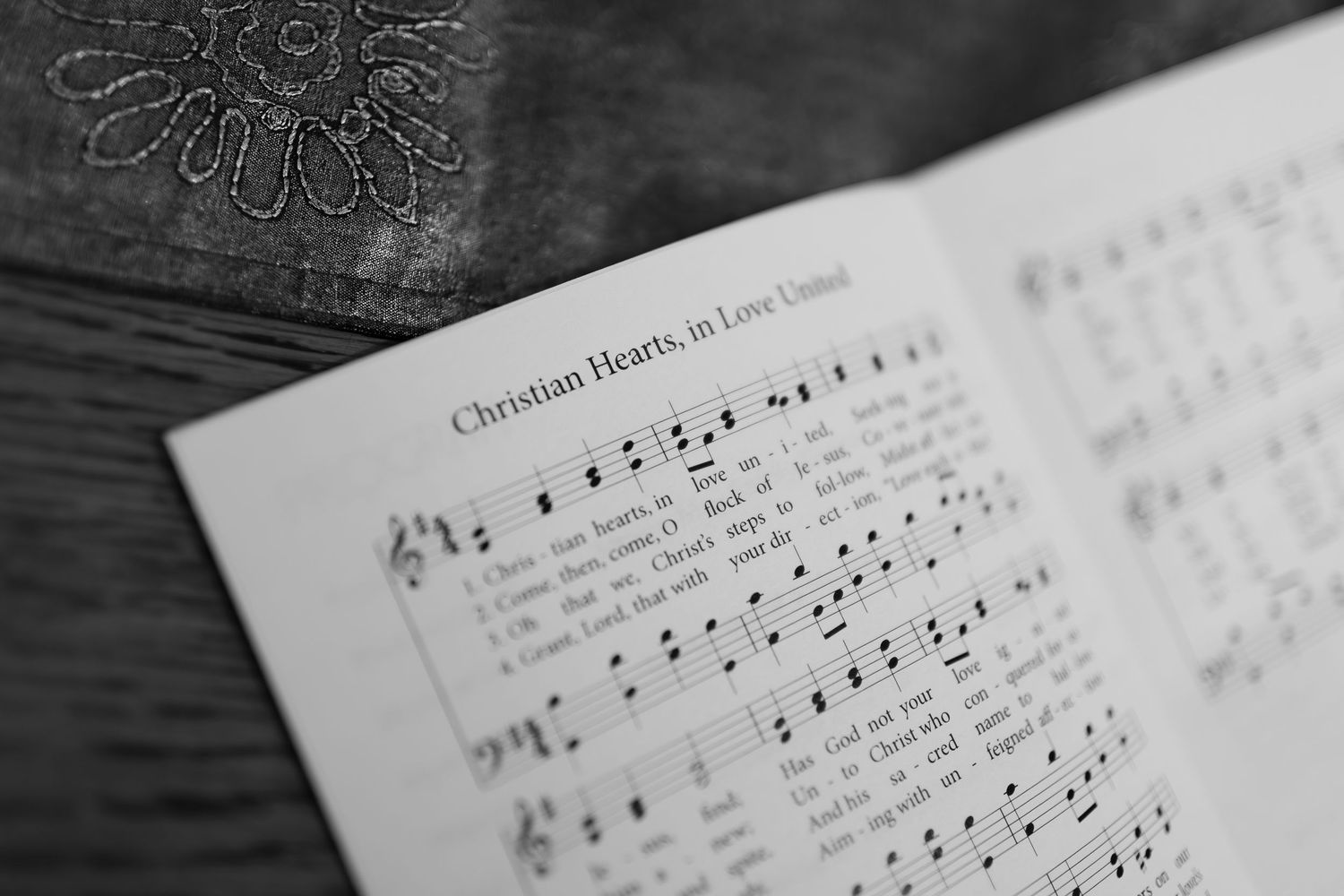 Sheet music notes displayed on white paper with black musical notation.