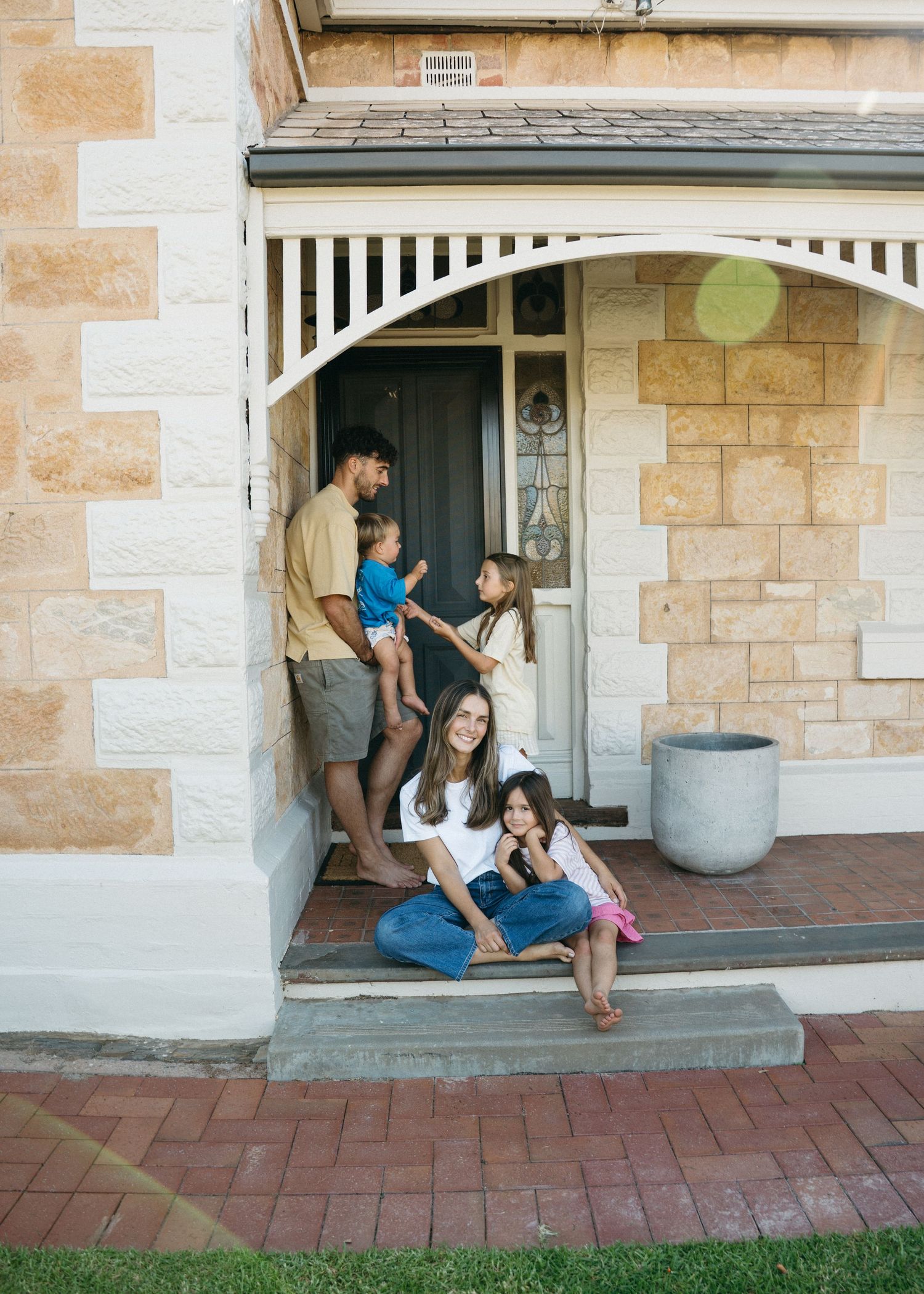 A bright and colourful family photoshoot at home in Adelaide. Full of chaos and fun.