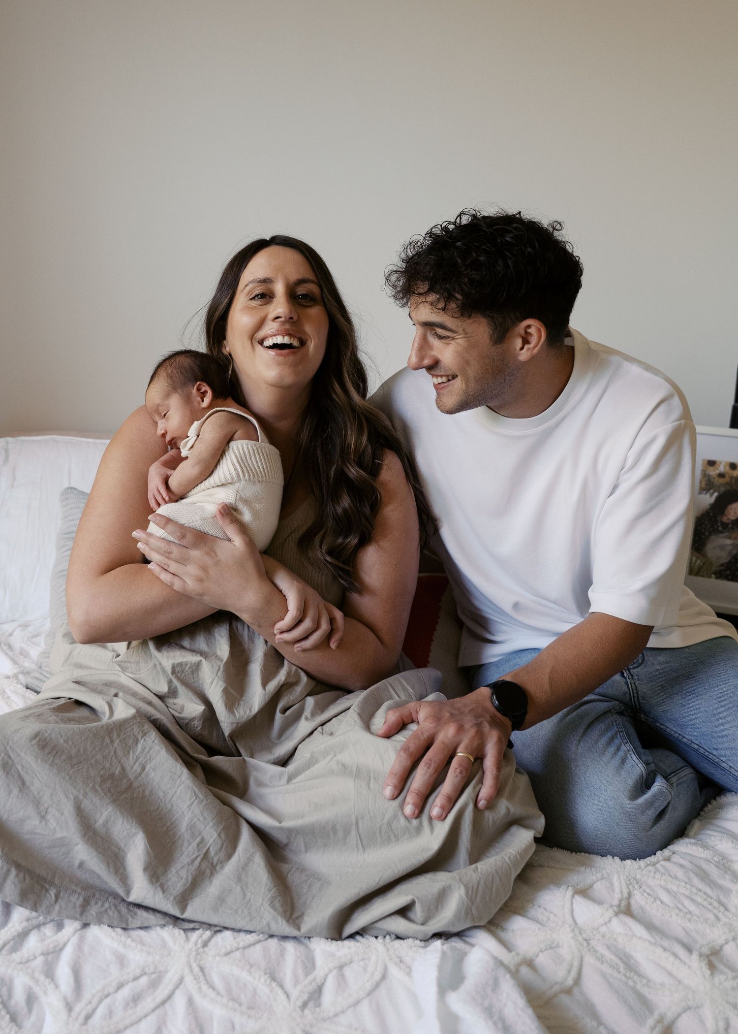 A newborn photography session at a family home with their 2 week old baby boy.