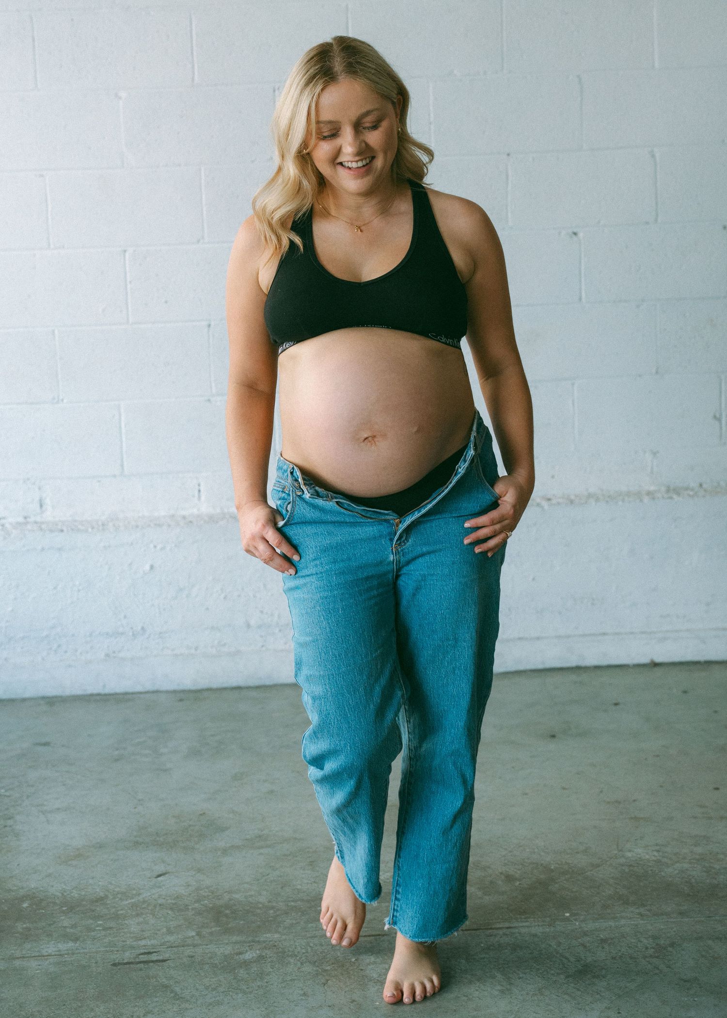 An Adelaide mother at a maternity photoshoot at in an Adelaide studio.