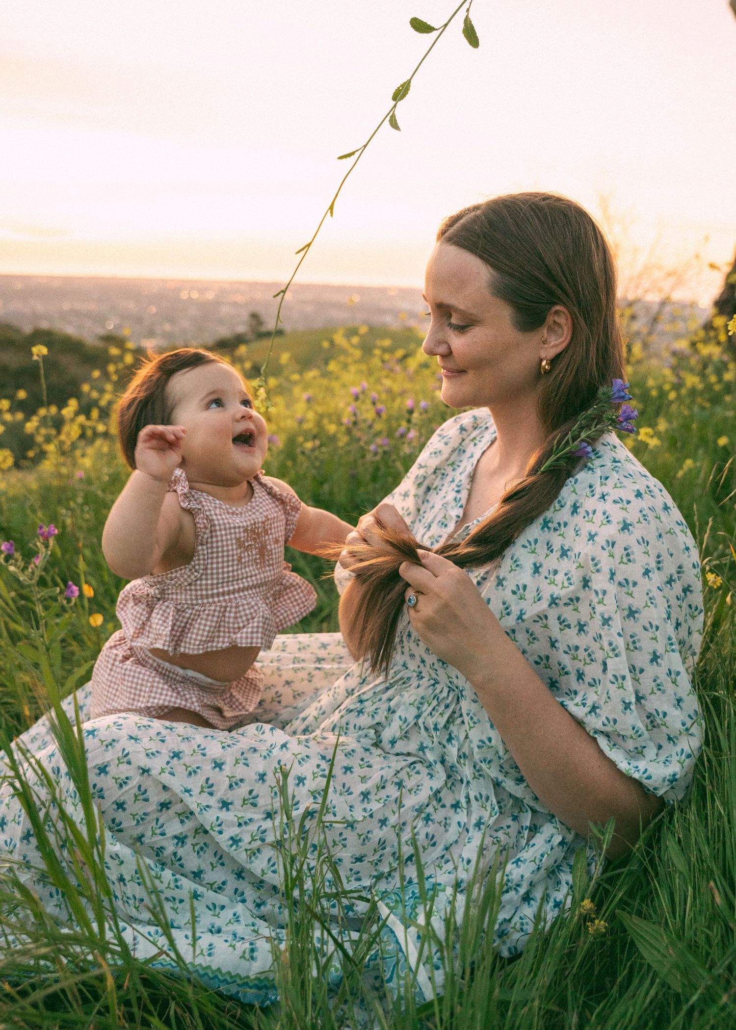 A motherhood photo shoot at sunset at Mount Osmond with a mother and her baby.