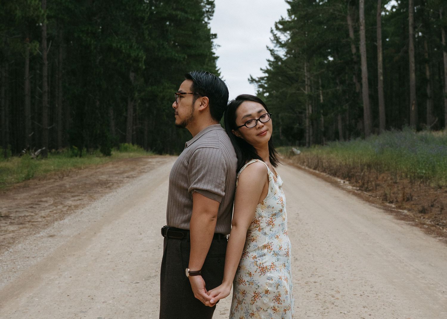 An Adelaide couple at a maternity photoshoot in the forest at golden hour.