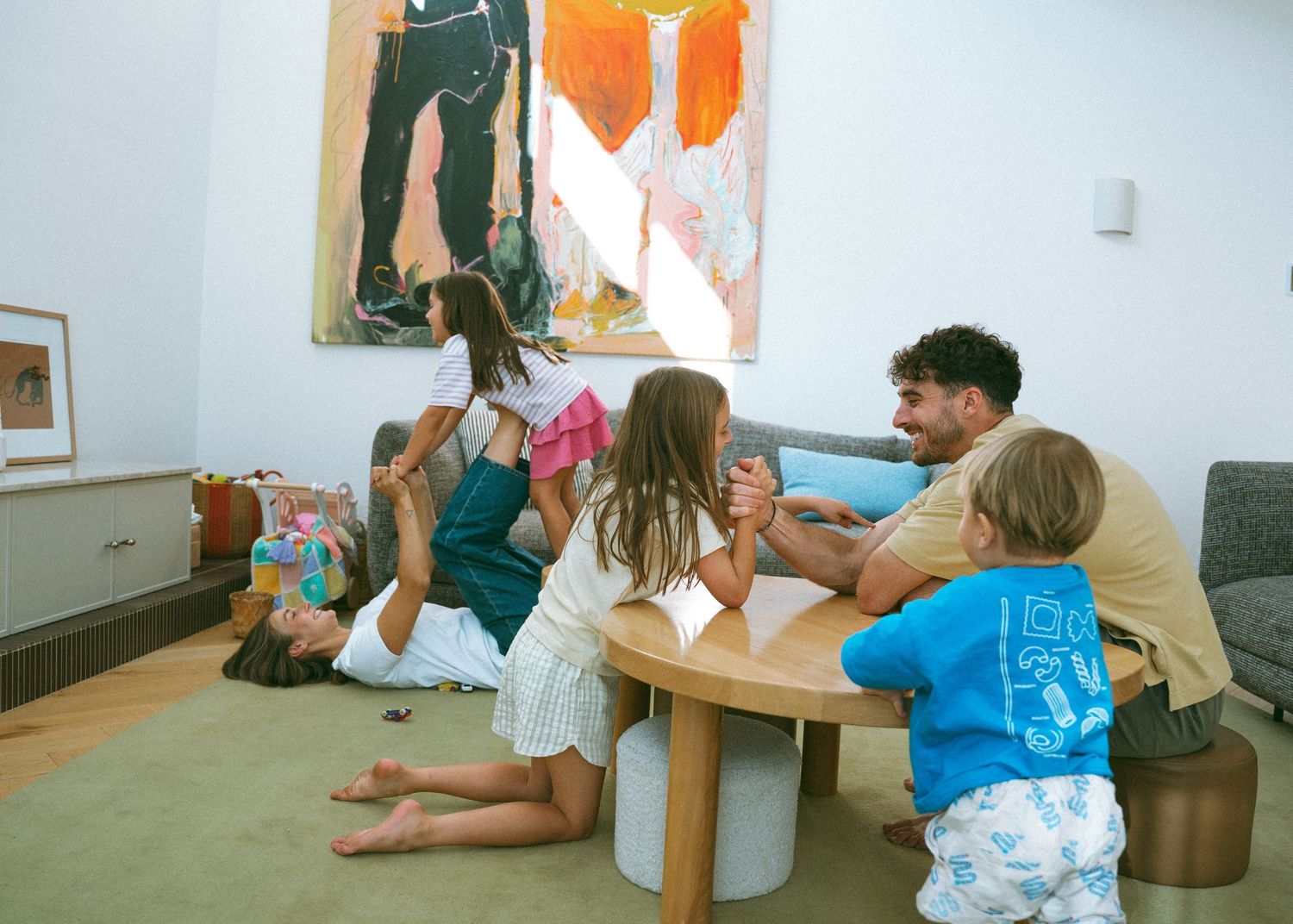 A bright and colourful family photoshoot at home in Adelaide. Full of chaos and fun.