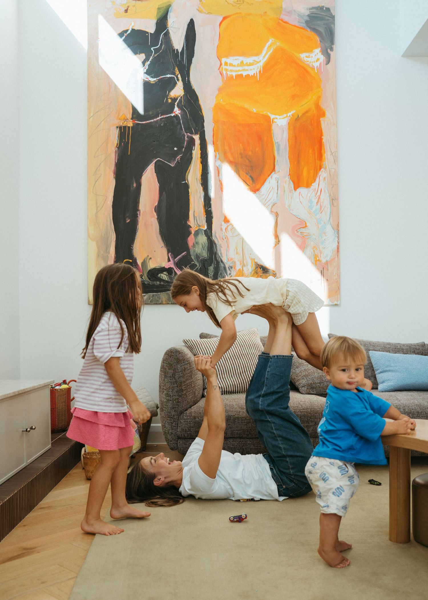A bright and colourful family photoshoot at home in Adelaide. Full of chaos and fun.