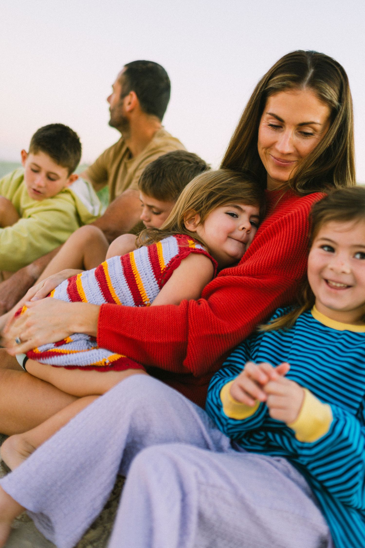 Meet Justine Edwards. A family photography session at the beach at sunrise with their 4 children.