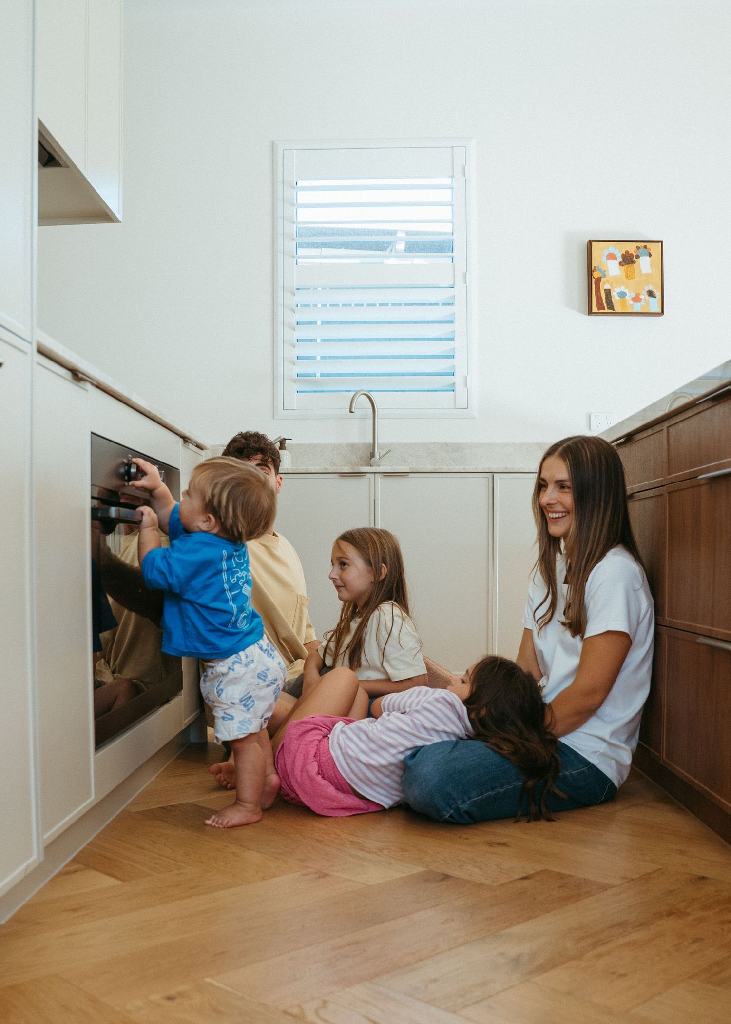 A bright and colourful family photoshoot at home in Adelaide. Full of chaos and fun.