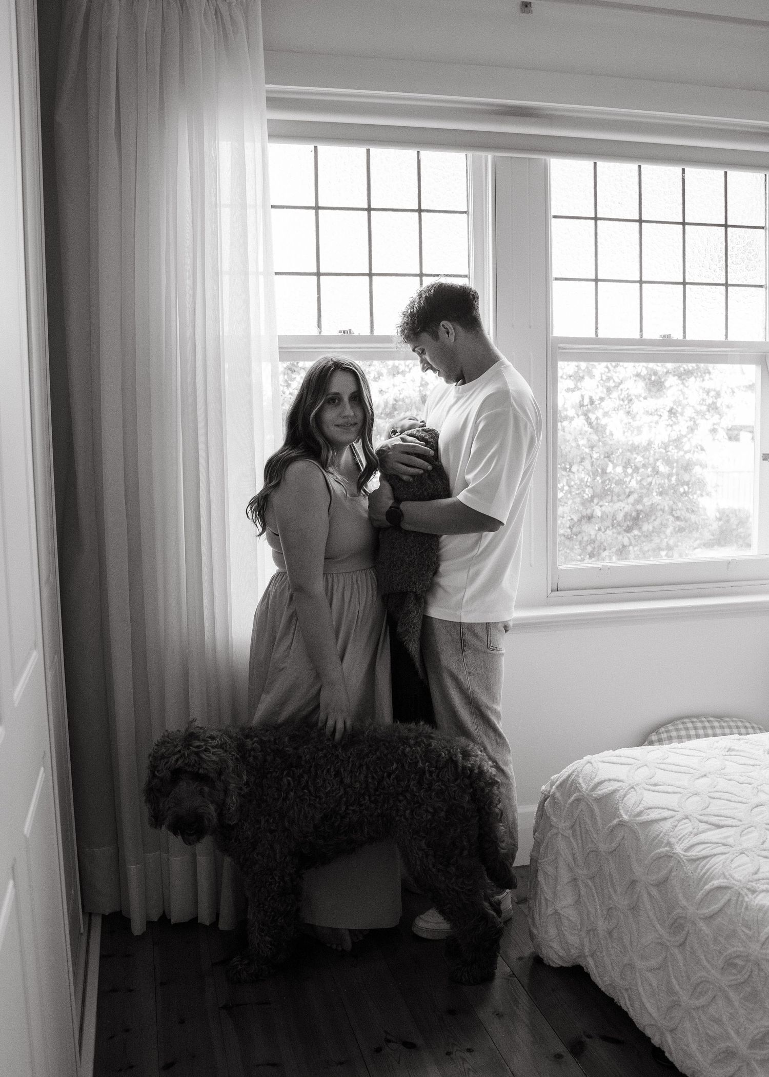 A newborn photography session at a family home with their 2 week old baby boy.