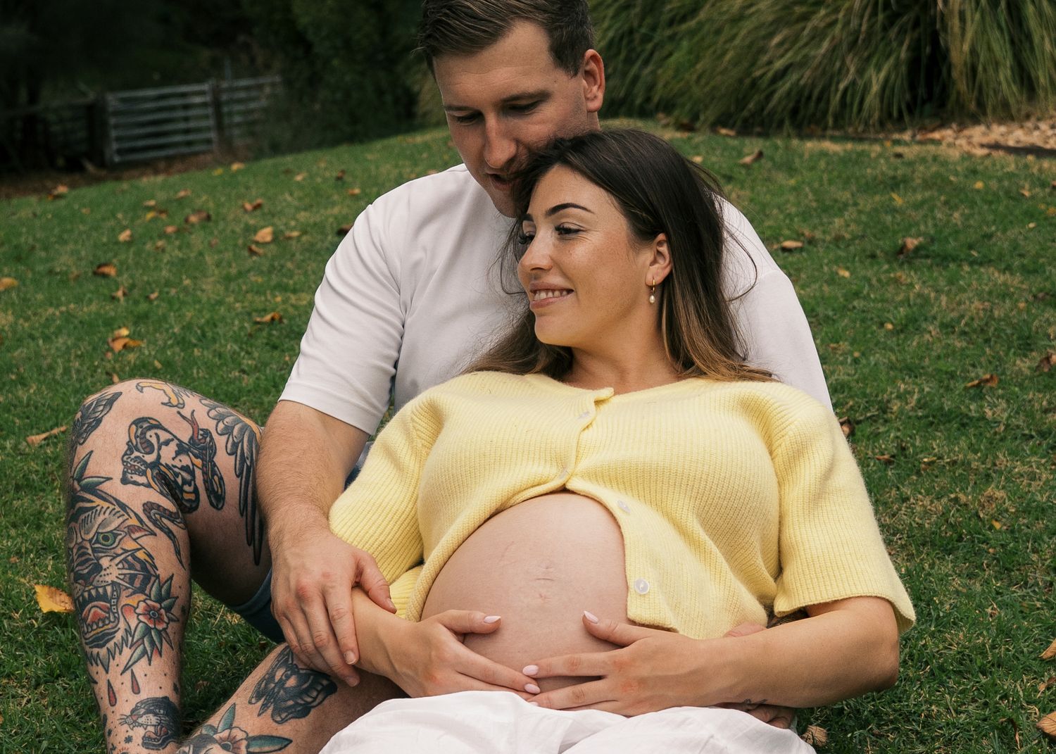 A maternity family photography session in the hills at sunset.