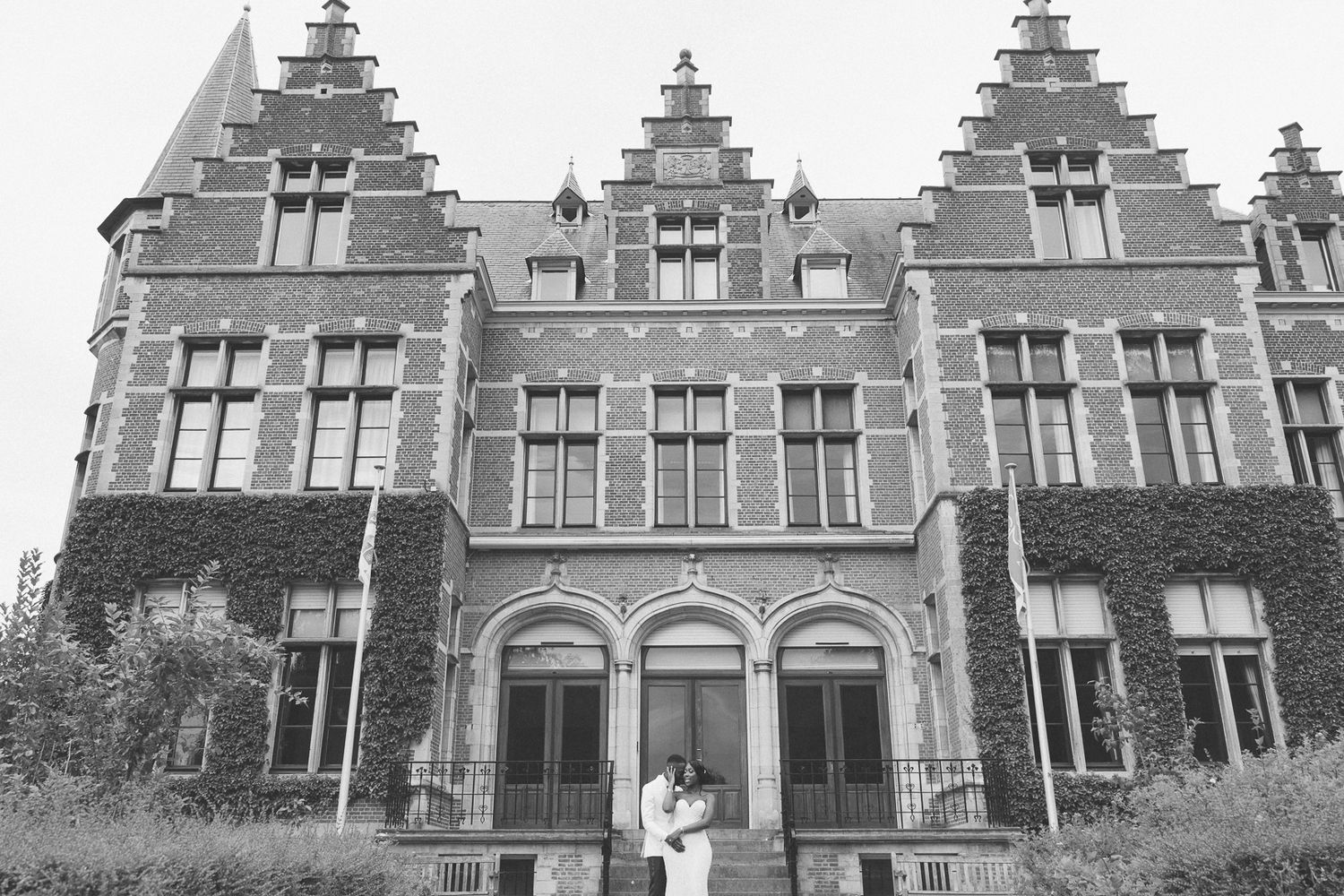 Row of classic Dutch-style houses with distinctive stepped gable roofs and traditional architecture.