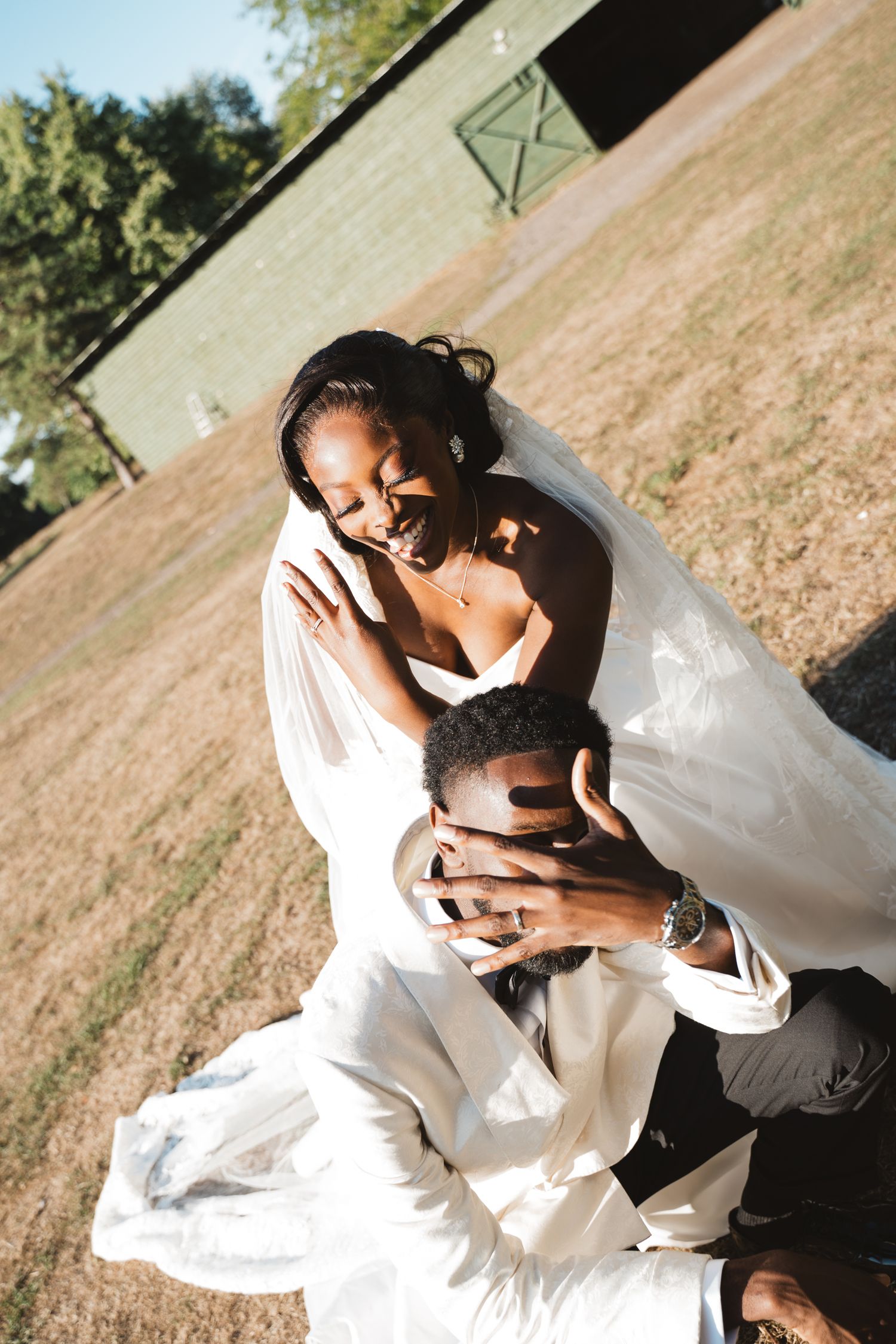 A romantic wedding photoshoot sequence showing a couple embracing in an outdoor setting.
