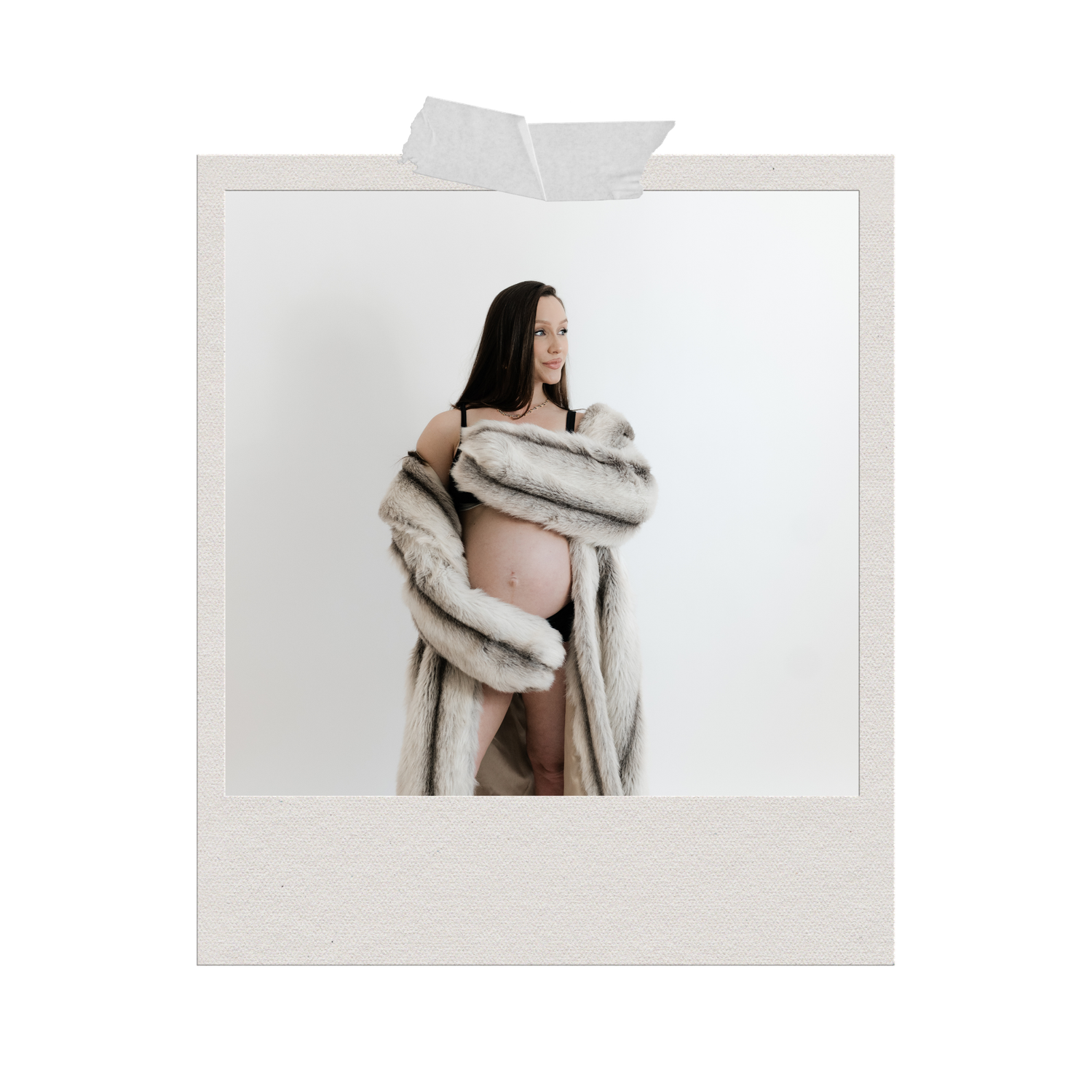 Pregnant woman posing in an open fur coat, showcasing her baby bump in a minimalist white studio setting.