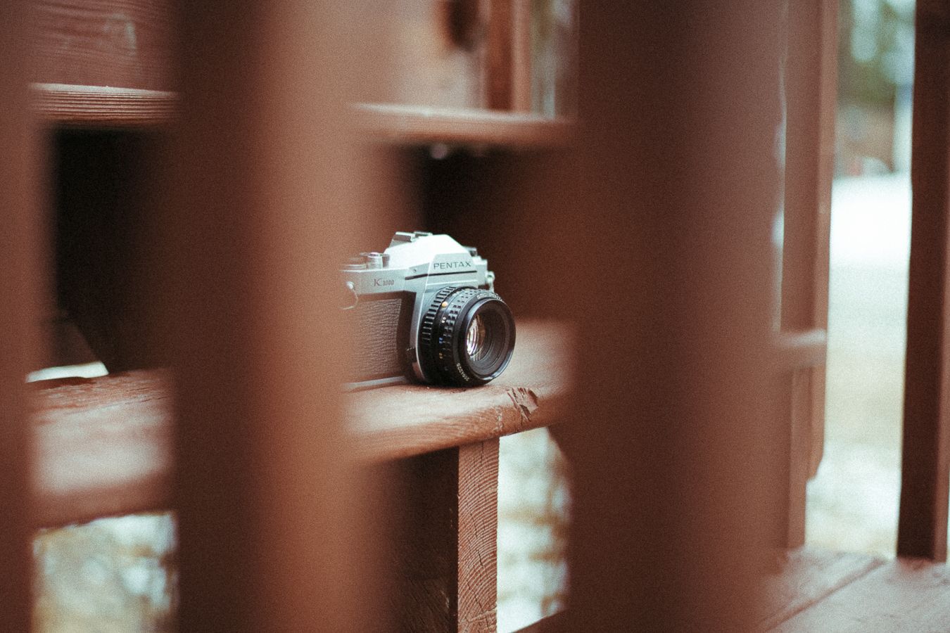 Abstract brown tones create geometric patterns in architectural detail shot.