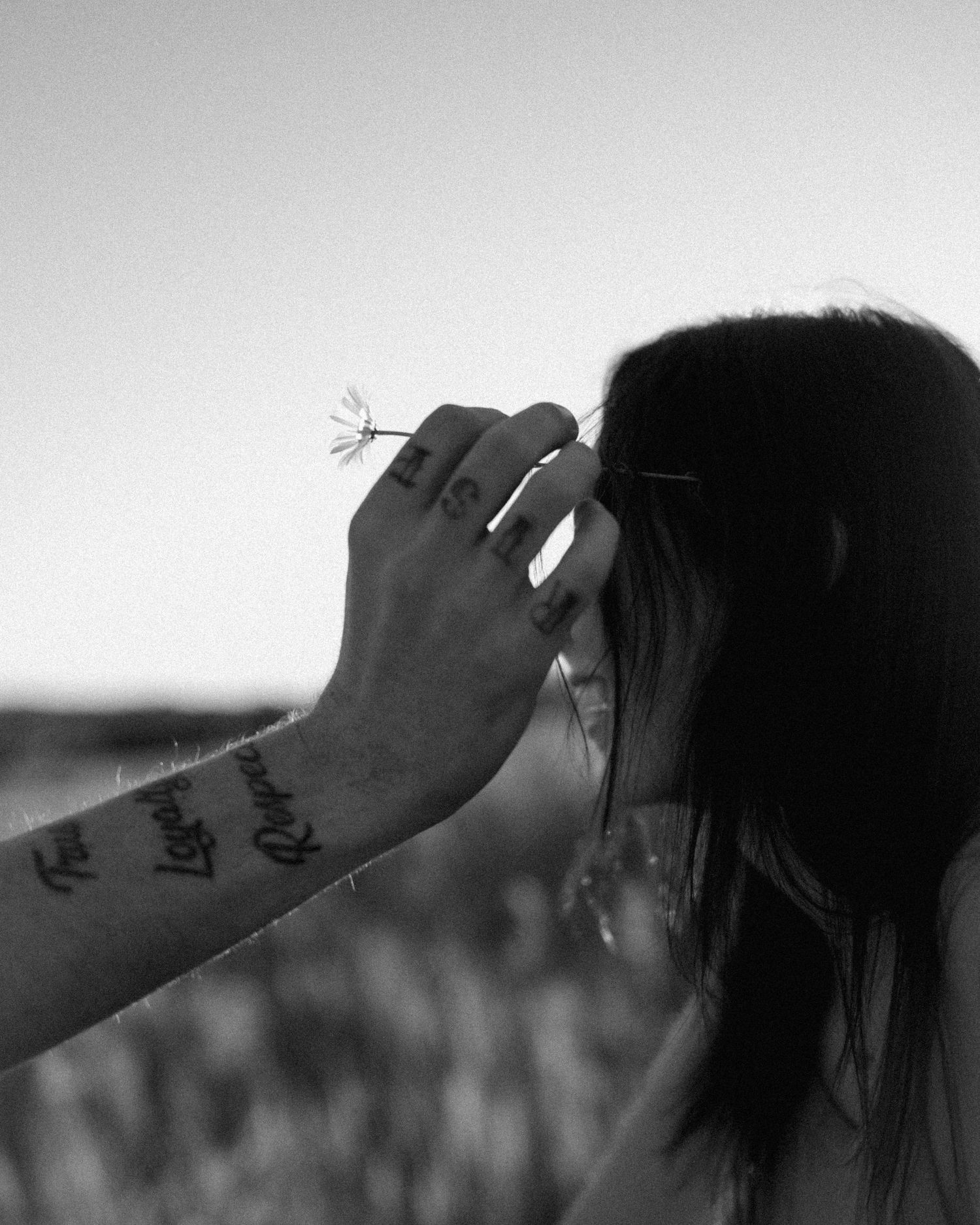 Black and white artistic portrait series showing silhouetted profile poses against a light background.