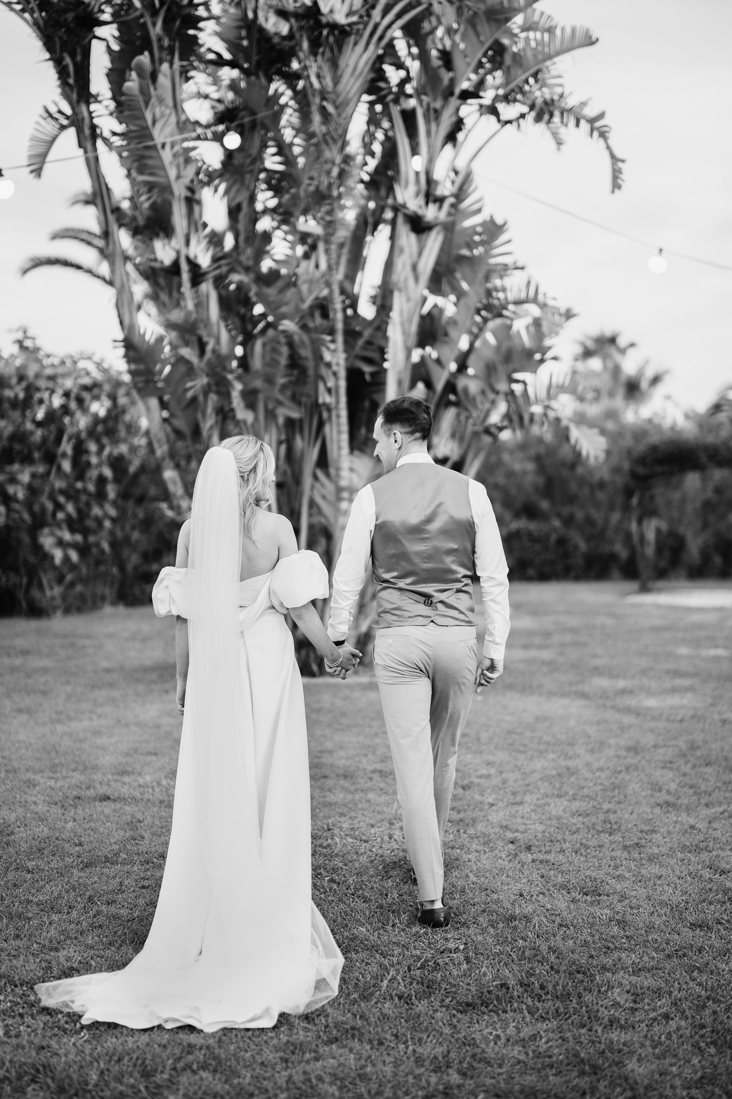 bride and groom walking portrait