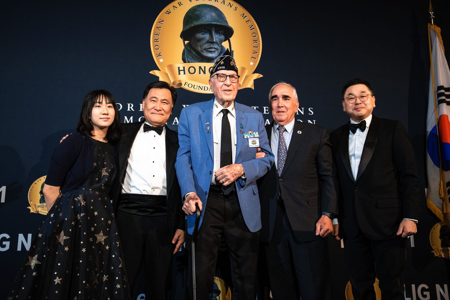 Group of five people pose together at Korean War Veterans Memorial Foundation gala.