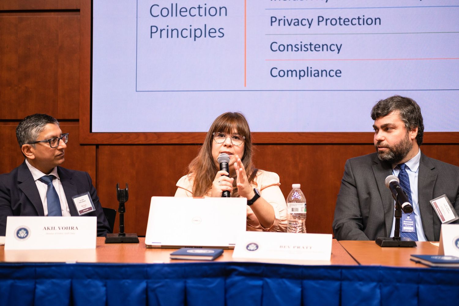 Panel discussion on data collection principles, privacy protection, consistency, and compliance at a professional conference.