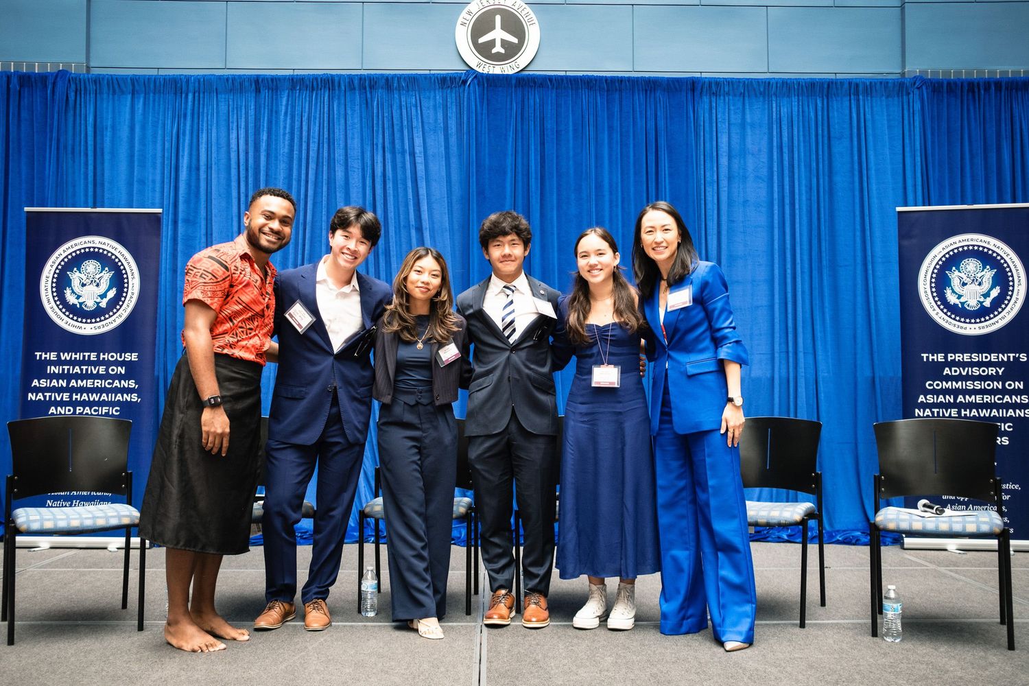 Six diverse young professionals pose together at a White House Initiative AANHPI advisory event.
