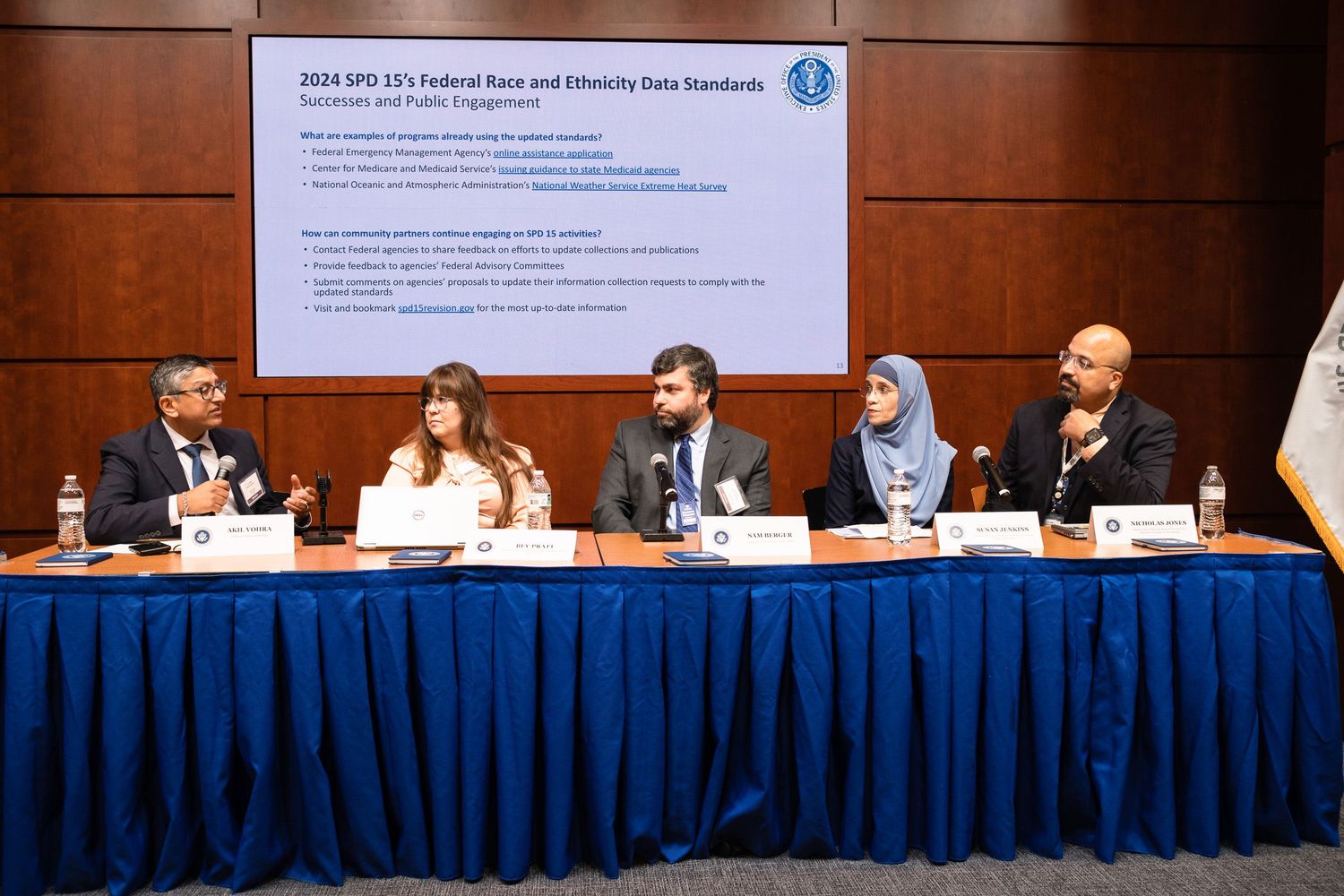 Panel of five diverse professionals discussing 2024 SPD-15 Federal Race and Ethnicity Data Standards at a conference.
