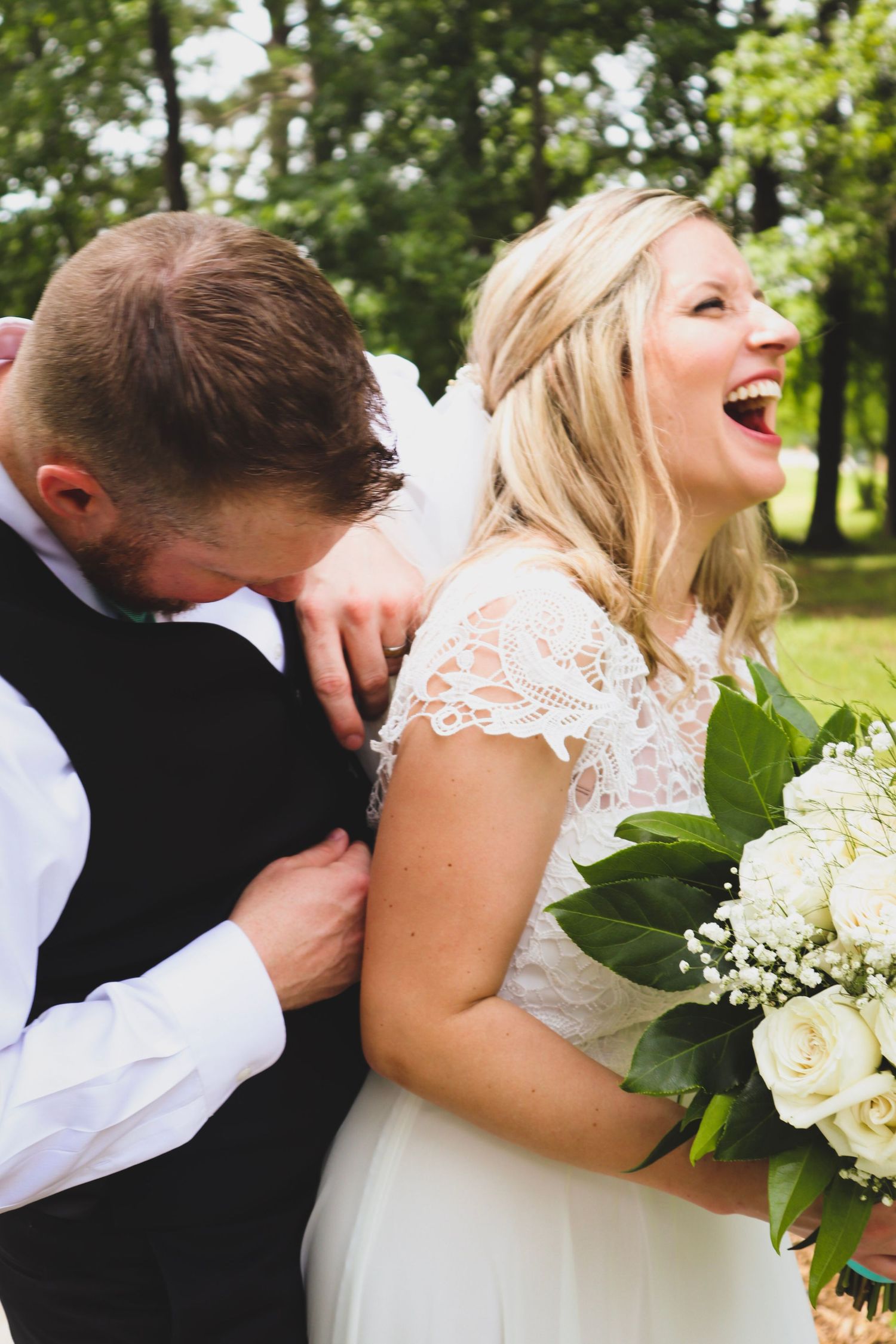 A series of candid wedding photos showing a couple laughing and embracing while holding a white floral bouquet outdoors.