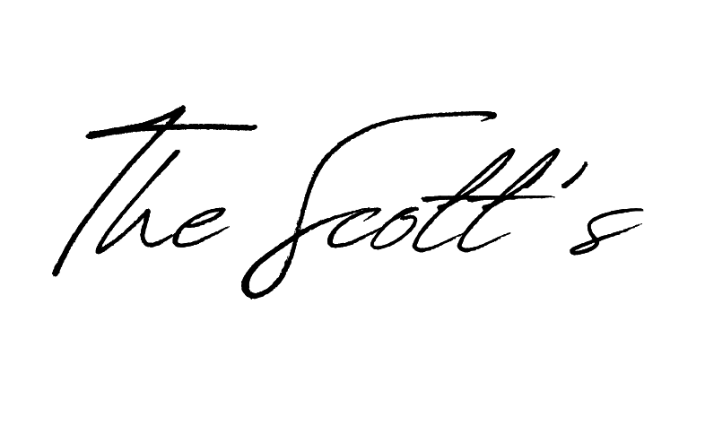 A stylized cursive signature reading 'The Scott's' written in black ink.
