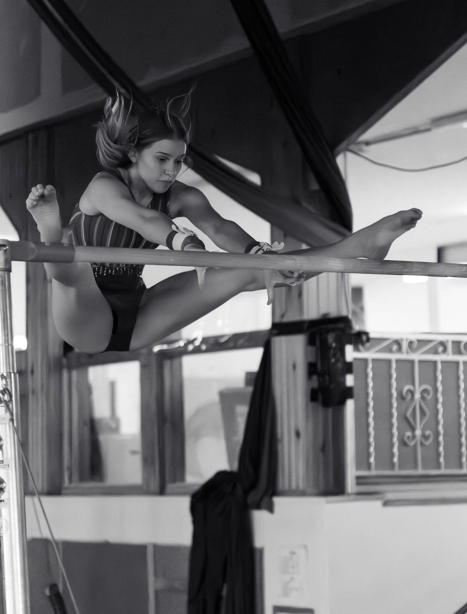 Gymnastics action shot on bars