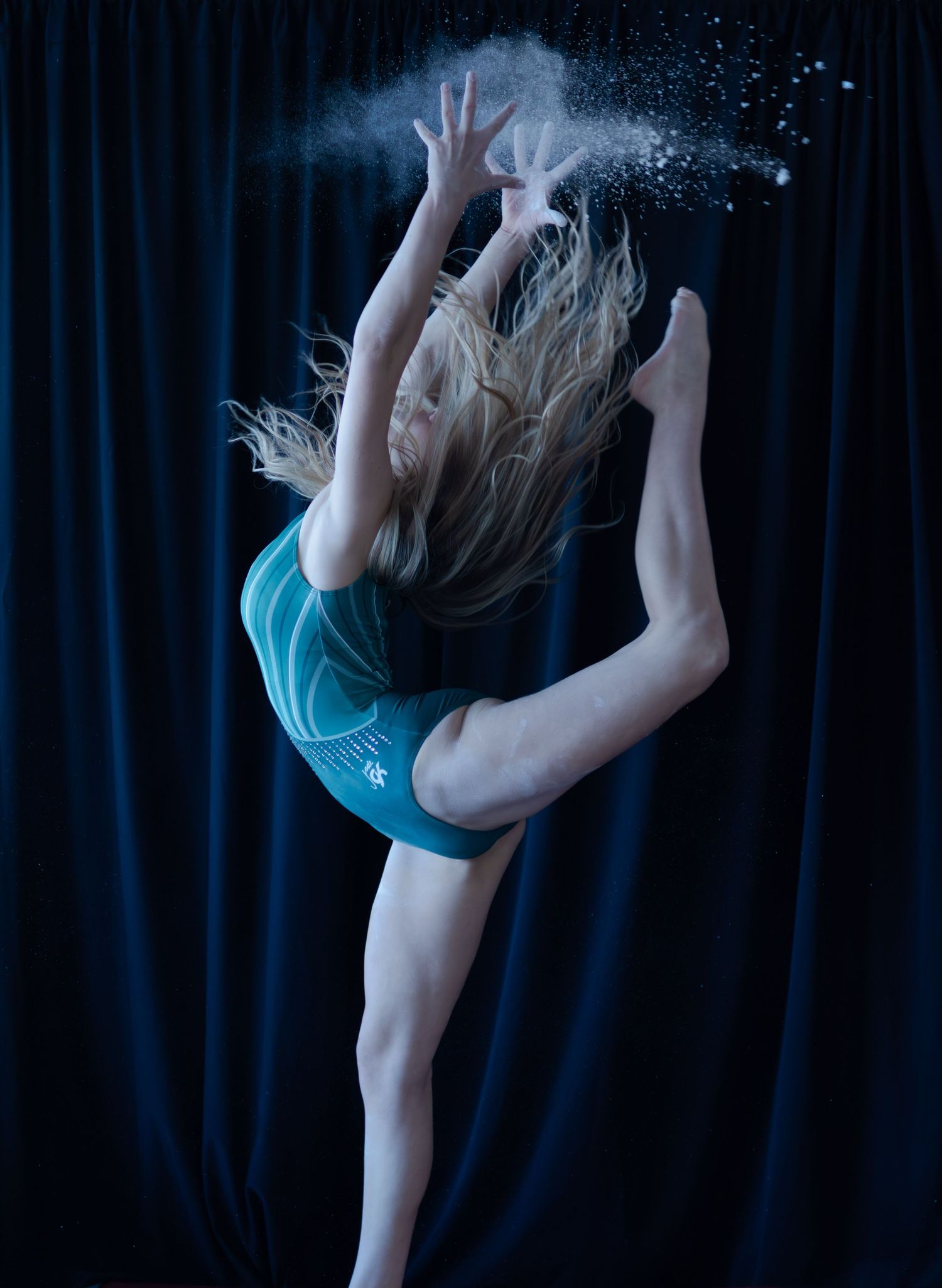 gymnastics portrait kicking leg up