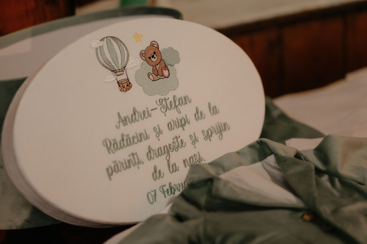 Personalized embroidered oval keepsake gift with teddy bear and hot air balloon for baby Andrei-Stefan.