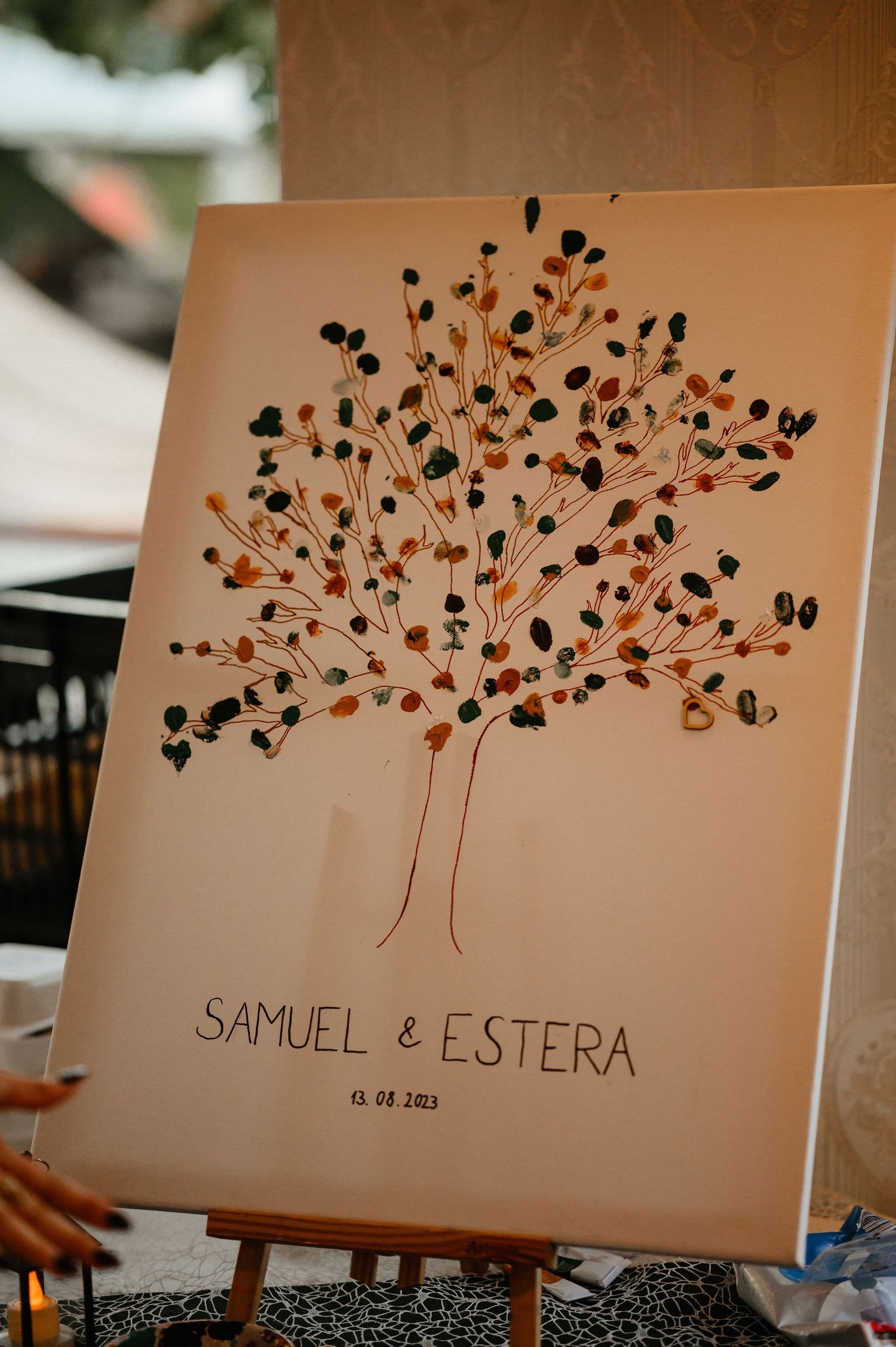 Wedding fingerprint tree guest book art signed by Samuel and Estera on August 13, 2023.