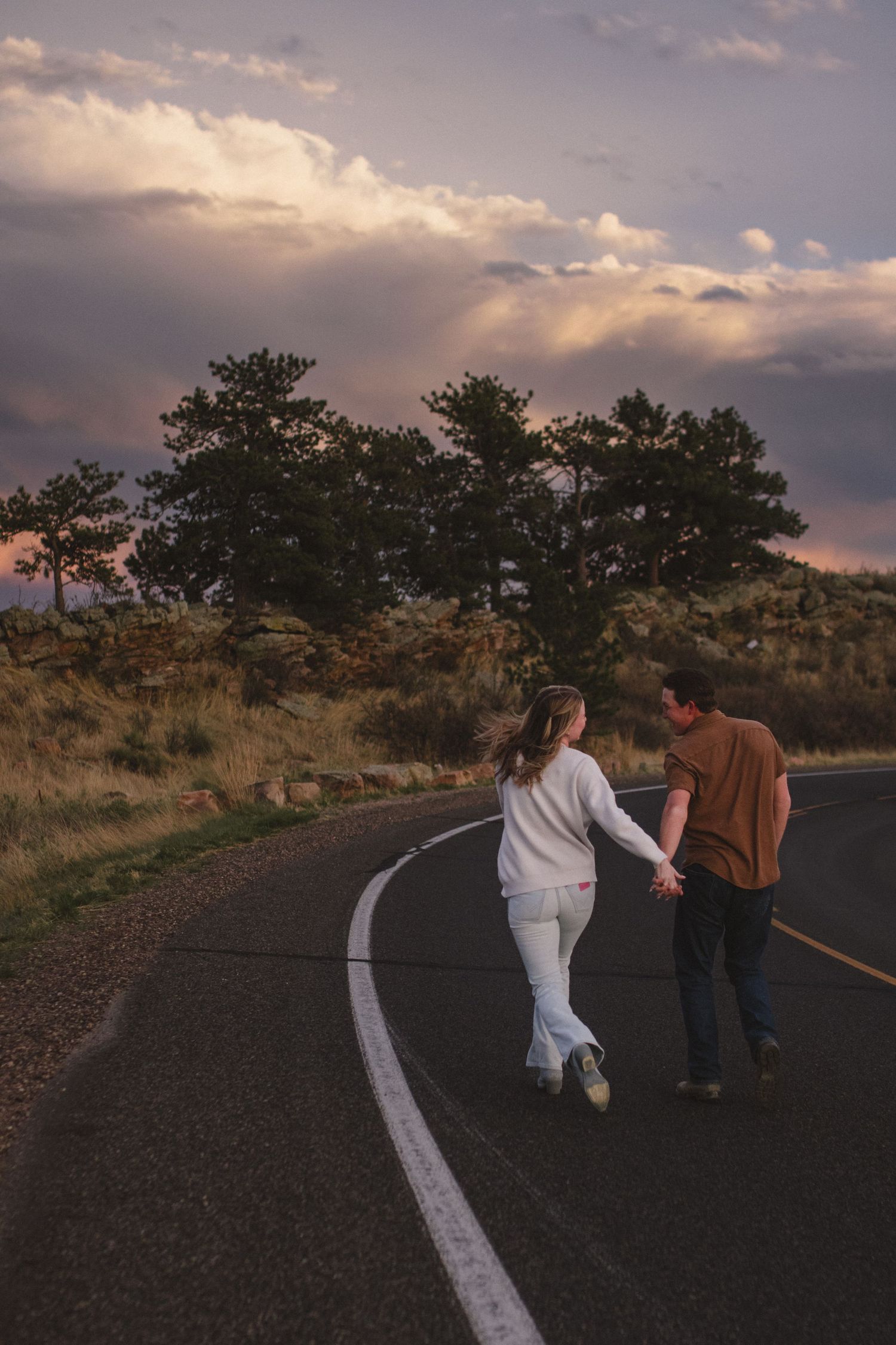 Couple dancing together during summer sunset session in fort collins
