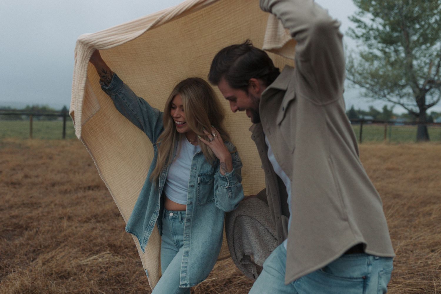 Playful couples photography session with movement and laughter