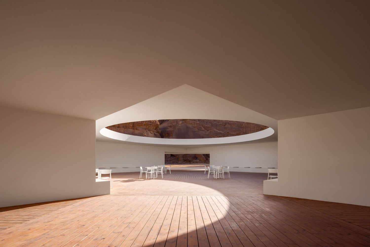 Wide angle view of entering the courtyard of the Desert X AlUla 2024 visitor center by KWY.studio