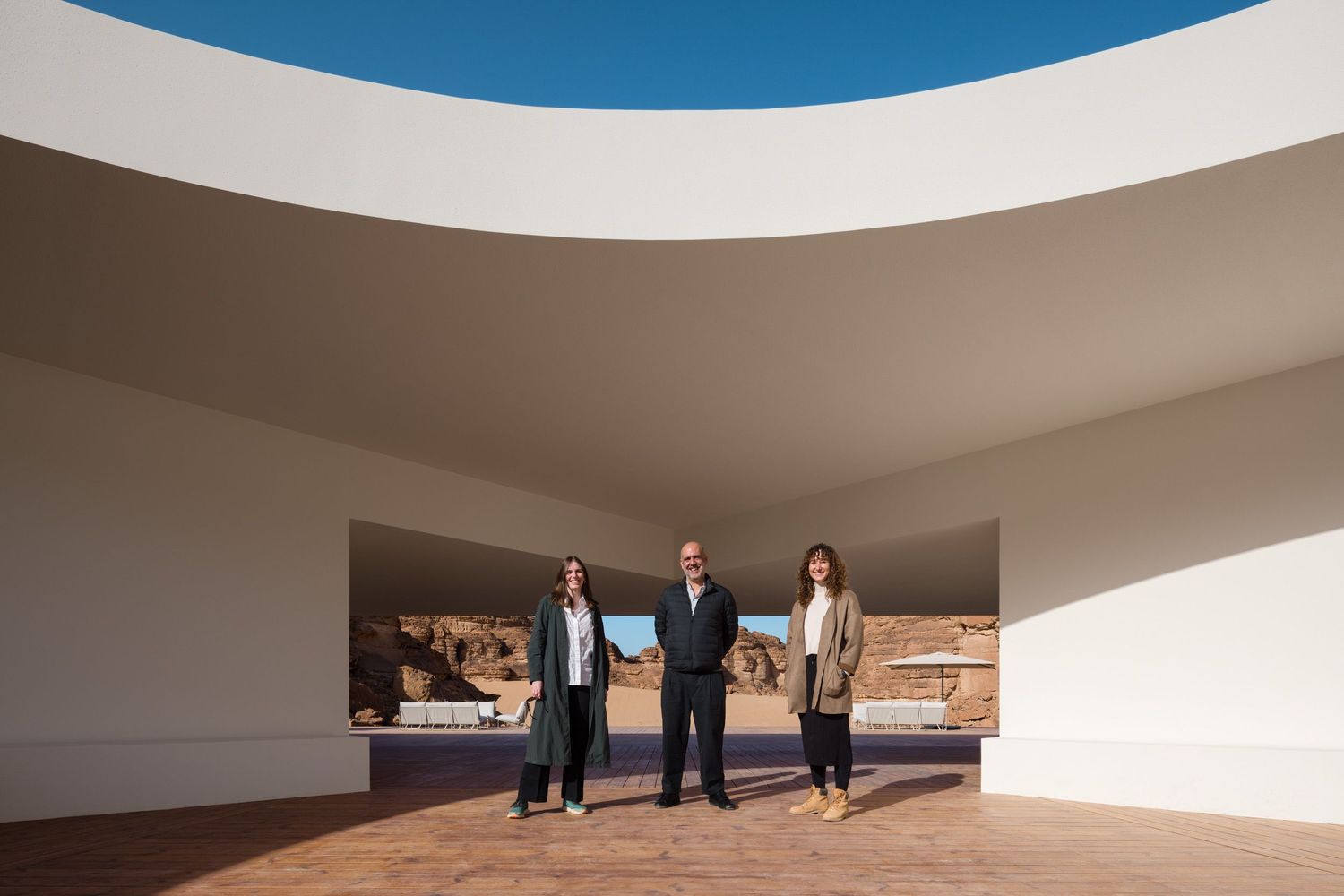 Luise, Riccardo, and Charlie of KWY.studio, the architects of the Desert X AlUla 2024 visitor center in AlUla Saudi Arabia