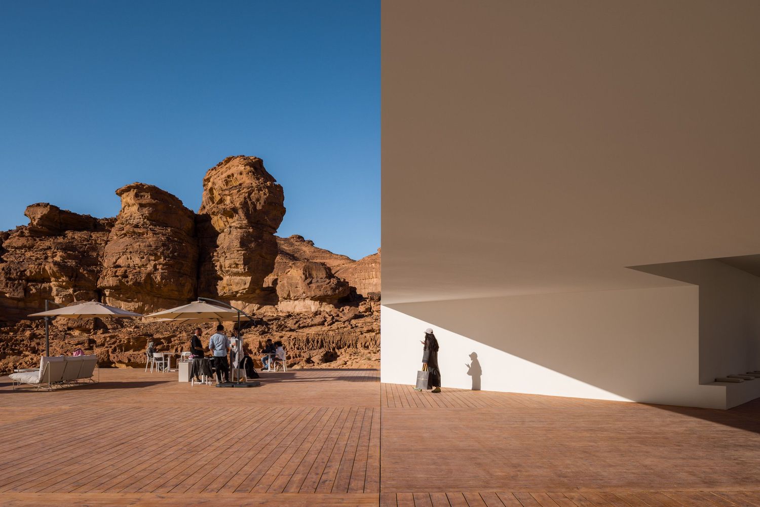 Side profile view of the entrance opening of the Desert X AlUla 2024 visitor center by KWY.studio