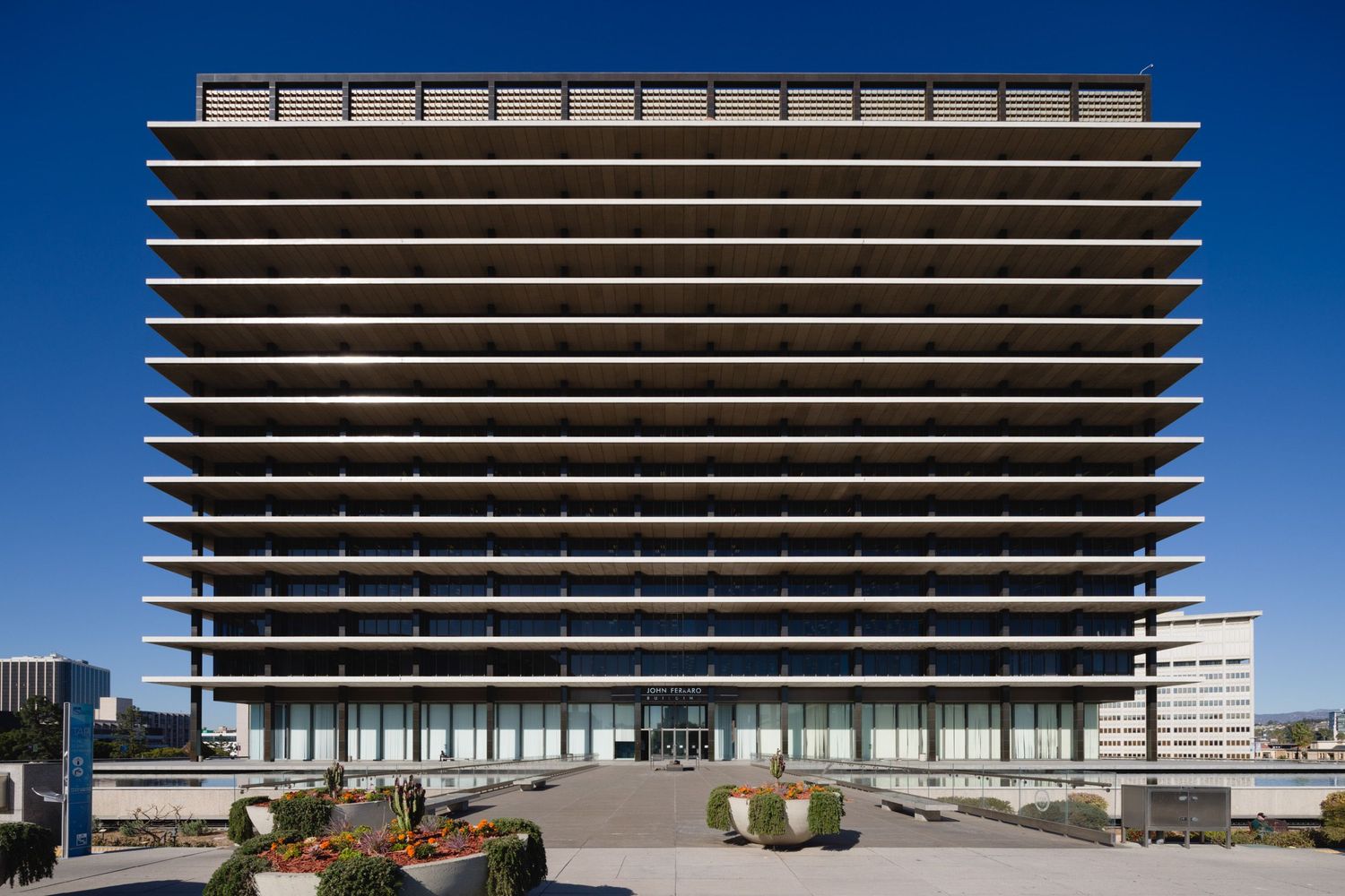 Full front axis daytime view of Department of Water and Power/John Ferraro building in Los Angeles