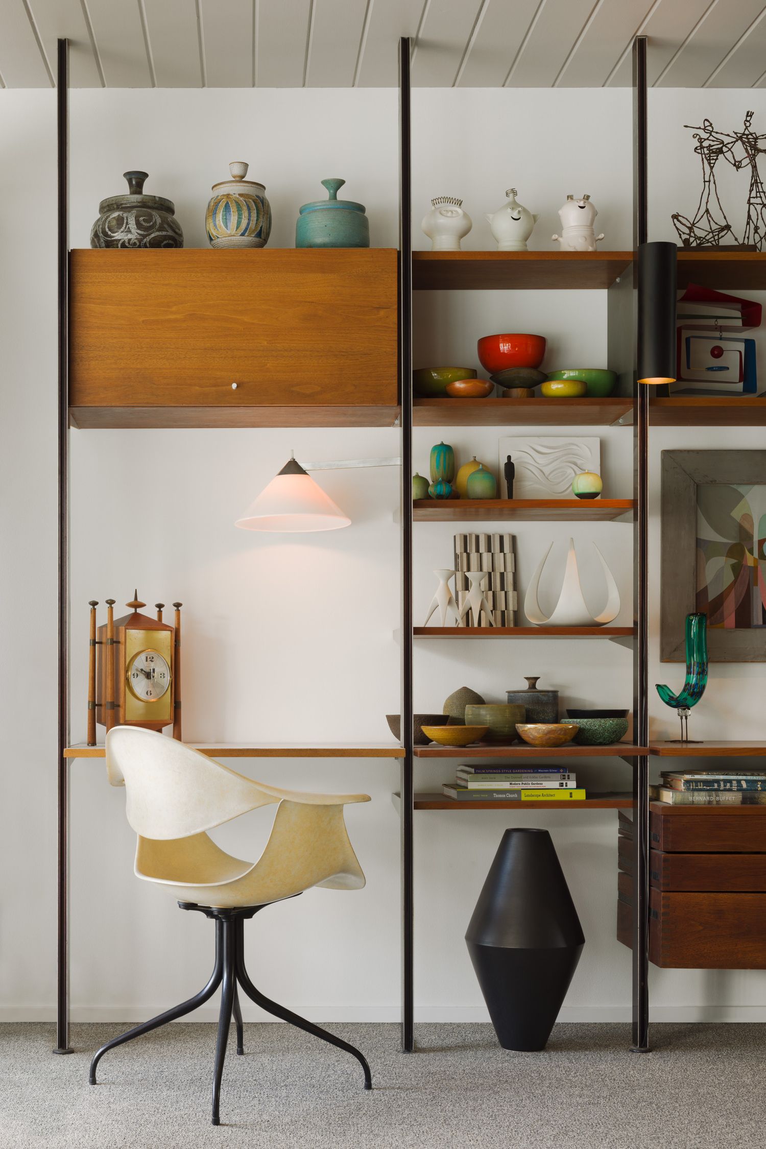 mid-century modern wall unit with lots of decor