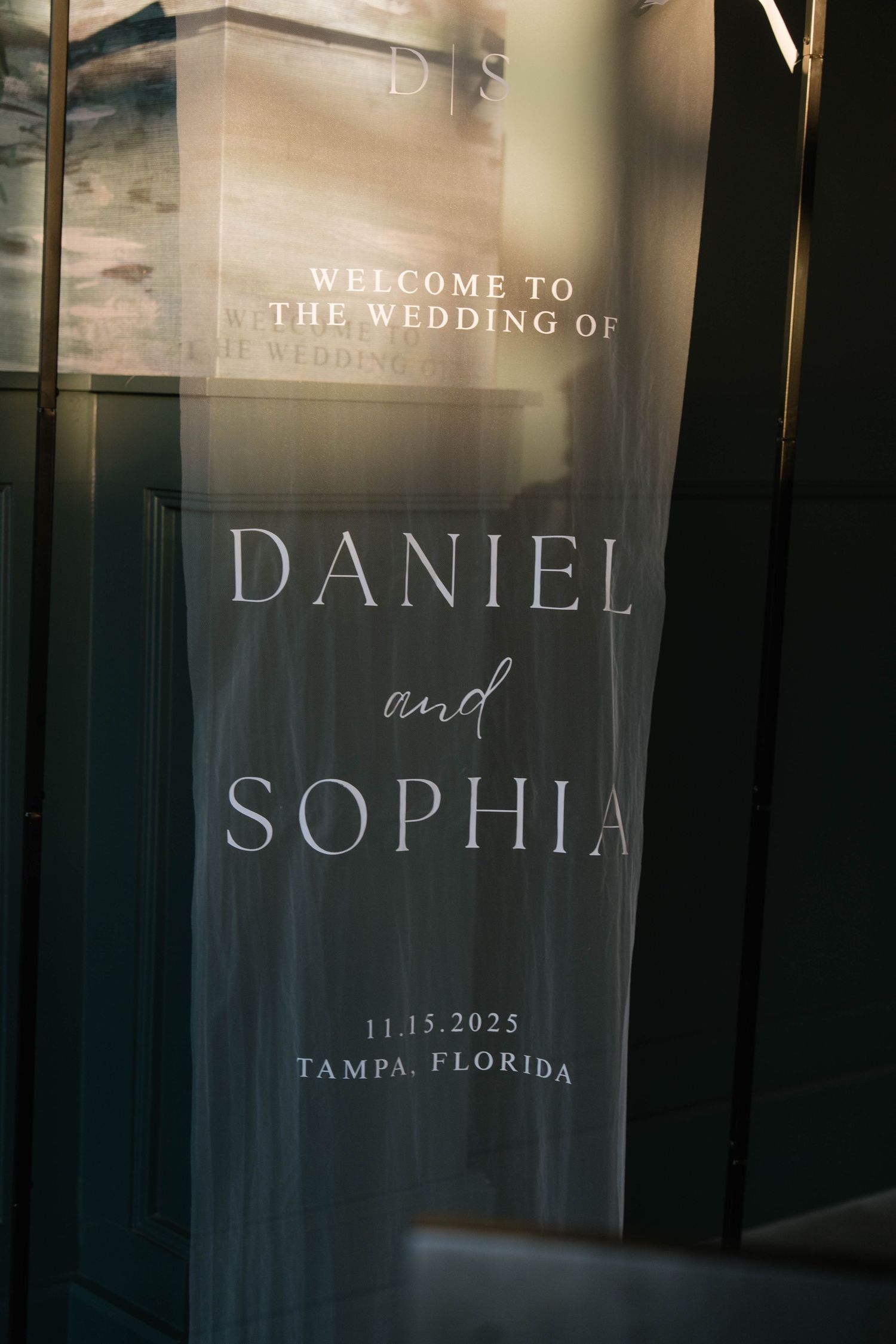 Frosted acrylic wedding welcome sign for Daniel and Sophia dated November 15, 2025 in Tampa, Florida.