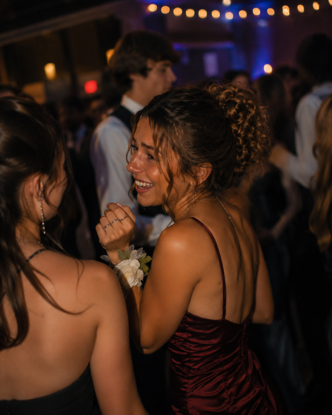 Prom and event photography moment with two young women dancing in the Fraser Valley.