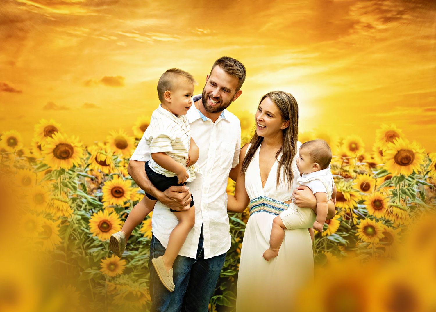 A family portrait scene surrounded by vibrant yellow sunflowers during golden hour sunset.