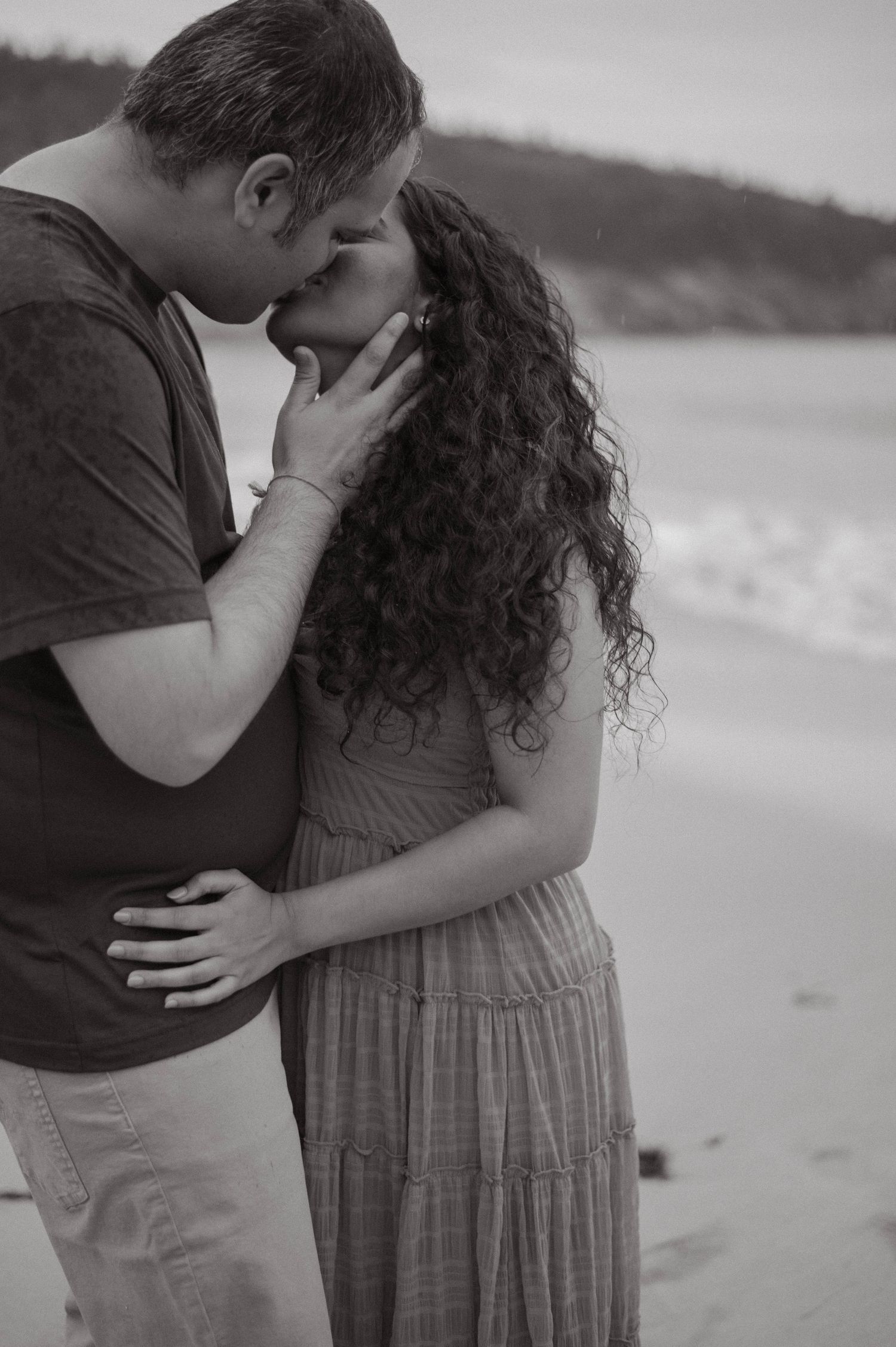 Romantic couple photography on the beach in Acadia, capturing timeless moments against the stunning coastal backdrop. Perfect for engagement