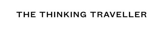 The Thinking Traveller brand logo in black lettering on white.