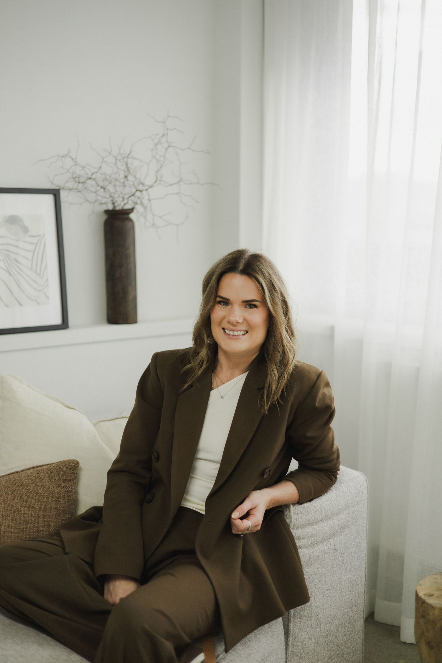Female business owner smiling during professional photoshoot session